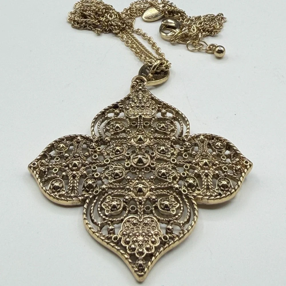 Charming Charlie ornate gold